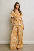 Sandscript Surplice Wasit Tie Jumpsuit
